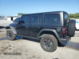 2023 Jeep Wrangler Rubicon z VIN 1C4JJXR62PW663711, wystawiony jako Copart lot #54816255 z przebiegiem 29 123 mil mil oraz Szkoda całkowita • Salvage title. Historia ofert i sprzedaży dostępna na DreamBid. Obrazek 2.