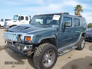2005 Hummer H2 SUV with VIN 5GRGN23U35H105620, listed as a IAAI auction lot 41912574 with 232,938 mi miles. Bid and sale history available at carsss.com. Image 18.