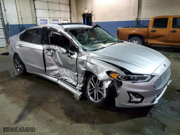 2019 Ford Fusion Hybrid Titanium with VIN 3FA6P0RU4KR136653, listed as a Copart auction lot 85477654 with 197,404 mi miles and Non Repairable. Bid and sale history available at carsss.com. Image 4.