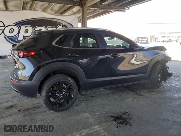 2024 Mazda CX-30 S Select Sport with VIN 3MVDMBBM0RM699317, listed as a Copart auction lot 63411325 with 30,364 mi miles and Clean title. Bid and sale history available at DreamBid. Image 3.