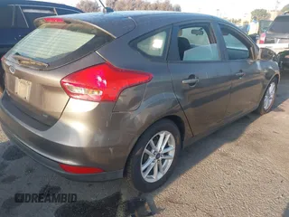 2015 Ford Focus SE with VIN 1FADP3K26FL342515, listed as a IAAI auction lot 41981596 with 112,470 mi miles. Bid and sale history available at carsss.com. Image 4.