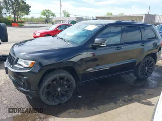 2014 Jeep Grand Cherokee Overland with VIN 1C4RJFCT8EC106005, listed as a IAAI auction lot 41989721 with 148,469 mi miles and . Bid and sale history available at DreamBid. Image 15.