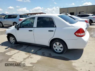2010 Nissan Versa 1.6 with VIN 3N1CC1AP5AL403629, listed as a Copart auction lot 58264865 with 86,399 mi miles and Salvage title. Bid and sale history available at DreamBid. Image 2.
