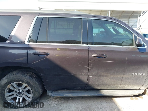 2015 Chevrolet Tahoe LS with VIN 1GNSCAKCXFR628303, listed as a IAAI auction lot 42002698 with 152,141 mi miles and . Bid and sale history available at DreamBid. Image 13.
