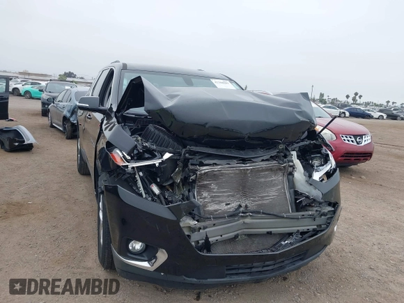 2018 Chevrolet Traverse LT Cloth z VIN 1GNERGKW4JJ127889, wystawiony jako IAAI lot #42368681 z przebiegiem 65 438 mil mil oraz . Historia ofert i sprzedaży dostępna na DreamBid. Obrazek 6.