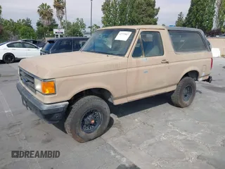 1988 Ford Bronco Eddie Bauer with VIN 1FMEU15N3JLA98943, listed as a IAAI auction lot 42771847 with 41,662 mi miles and . Bid and sale history available at DreamBid. Image 2.