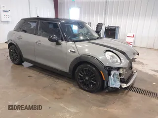 2015 MINI Hardtop 4 Door with VIN WMWXS5C58FT830081, listed as a IAAI auction lot 41345037 with 93,545 mi miles and . Bid and sale history available at DreamBid. Image 1.