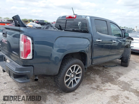 2019 GMC Canyon 4WD Denali with VIN 1GTG6EEN6K1354469, listed as a IAAI auction lot 41902101 with 27,096 mi miles. Bid and sale history available at carsss.com. Image 4.