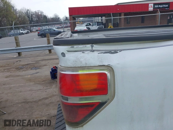 2013 Ford F-150 XL with VIN 1FTFX1ET7DKF44326, listed as a IAAI auction lot 41810428 with 215,491 mi miles and . Bid and sale history available at DreamBid. Image 6.