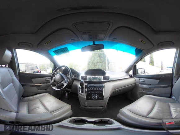 2012 Honda Odyssey EX-L with VIN 5FNRL5H60CB095086, listed as a IAAI auction lot 42251330 with 144,232 mi miles and . Bid and sale history available at DreamBid. Image 18.