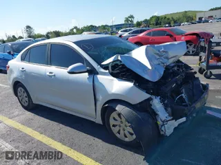 2018 Kia Rio LX with VIN 3KPA24AB0JE054428, listed as a IAAI auction lot 40101162 with 107,857 mi miles. Bid and sale history available at carsss.com. Image 1.