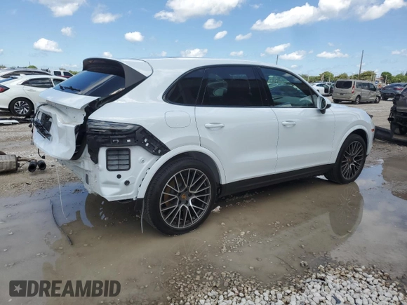 2023 Porsche Cayenne with VIN WP1AA2AY0PDA01300, listed as a Copart auction lot 56468895 with 32,576 mi miles and Salvage title. Bid and sale history available at DreamBid. Image 3.