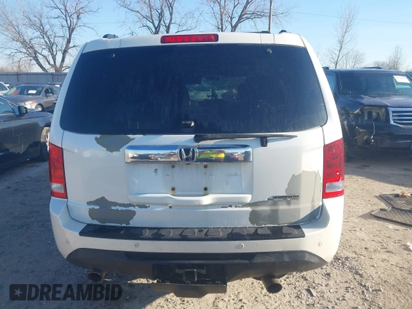 2014 Honda Pilot Touring with VIN 5FNYF4H96EB027336, listed as a IAAI auction lot 41882333 with 202,426 mi miles and . Bid and sale history available at carsss.com. Image 17.