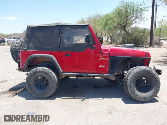 2000 Jeep Wrangler Sport with VIN 1J4FA49S0YP731544, listed as a IAAI auction lot 42570831 with Not provided miles and . Bid and sale history available at DreamBid. Image 14.