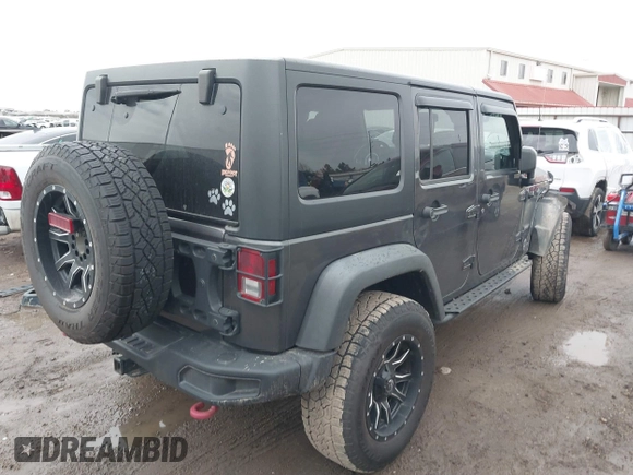 2018 Jeep Wrangler Unlimited Rubicon Recon with VIN 1C4BJWFG4JL827920, listed as a IAAI auction lot 41368319 with 110,835 mi miles and . Bid and sale history available at DreamBid. Image 4.