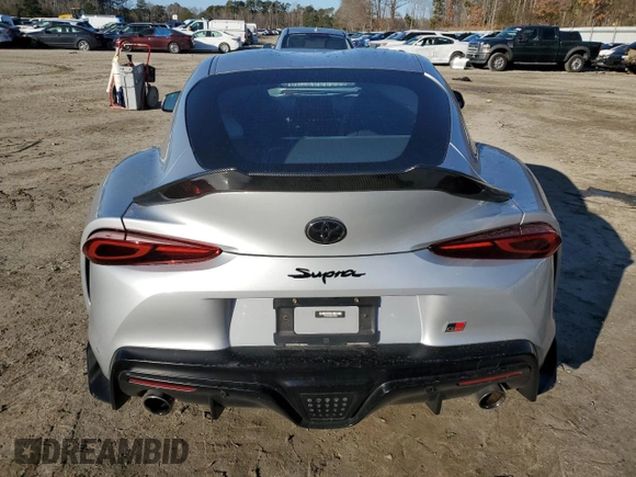 2022 Toyota Supra 2.0 with VIN WZ1DB2C08NW050265, listed as a Copart auction lot 88882465 with 14,576 mi miles and Salvage title. Bid and sale history available at DreamBid. Image 6.