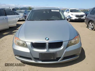 2007 BMW 3 Series 328i with VIN WBAVC53547FZ71265, listed as a Copart auction lot 54000075 with 130,559 mi miles and Salvage title. Bid and sale history available at DreamBid. Image 5.