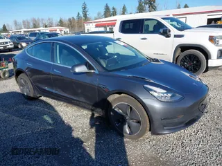 2020 Tesla Model 3 Long Range with VIN 5YJ3E1EB6LF647510, listed as a IAAI auction lot 41692902 with 69,736 mi miles. Bid and sale history available at carsss.com. Image 14.