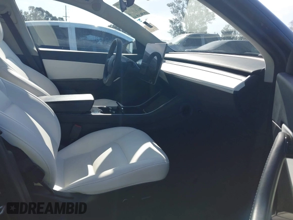 2021 Tesla Model Y Performance with VIN 5YJYGDEF1MF092889, listed as a IAAI auction lot 42076715 with 48,373 mi miles and . Bid and sale history available at DreamBid. Image 5.