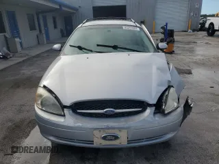 2003 Ford Taurus z VIN 1FAHP59U73A217826, wystawiony jako Copart lot #80059964 z przebiegiem 315 560 mil mil oraz Szkody całkowita. Historia ofert i sprzedaży dostępna na DreamBid. Obrazek 5.
