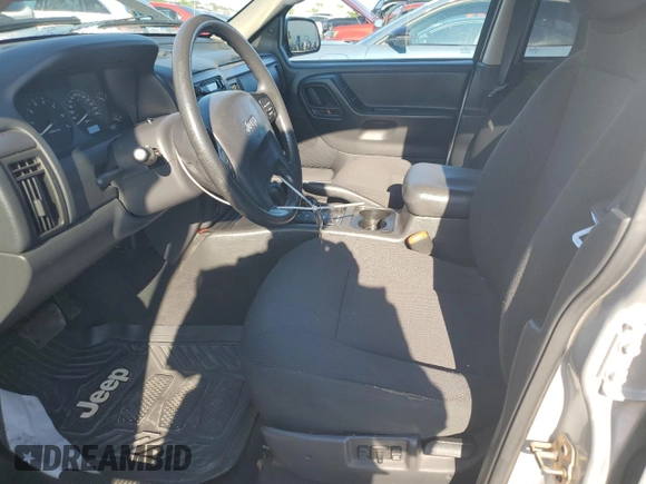 2004 Jeep Grand Cherokee Laredo z VIN 1J4GW48S94C425242, wystawiony jako Copart lot #63118015 z przebiegiem 157 076 mil mil oraz Czysty tytuł • Clean title. Historia ofert i sprzedaży dostępna na DreamBid. Obrazek 7.