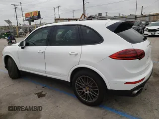 2017 Porsche Cayenne with VIN WP1AA2A24HKA81225, listed as a Copart auction lot 68863544 with 80,828 mi miles and Salvage title. Bid and sale history available at DreamBid. Image 2.