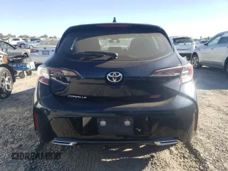 2019 Toyota Corolla Hatchback SE with VIN JTNK4RBEXK3029190, listed as a Copart auction lot 71320434 with 54,665 mi miles and Salvage Title. Bid and sale history available at carsss.com. Image 6.