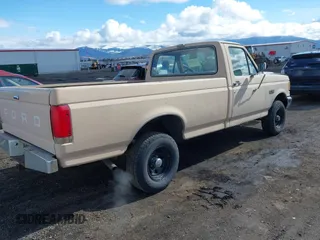1991 Ford F-150 with VIN 2FTEF14Y2MCA15592, listed as a IAAI auction lot 41798807 with 64,500 mi miles. Bid and sale history available at carsss.com. Image 4.