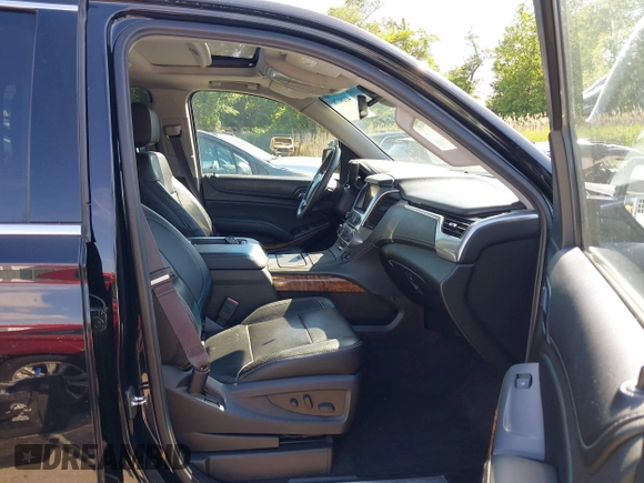 2015 Chevrolet Tahoe LTZ z VIN 1GNSKCKC3FR104845, wystawiony jako IAAI lot #42291785 z przebiegiem 75 047 mil mil oraz . Historia ofert i sprzedaży dostępna na DreamBid. Obrazek 5.