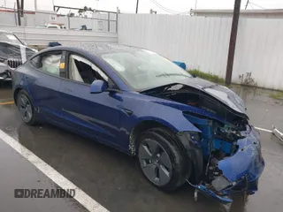 2022 Tesla Model 3 Long Range z VIN 5YJ3E1EB0NF122574, wystawiony jako IAAI lot #41739822 z przebiegiem Nie podano mil oraz . Historia ofert i sprzedaży dostępna na DreamBid. Obrazek 1.