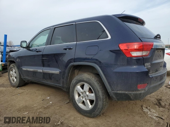2013 Jeep Grand Cherokee Laredo with VIN 1C4RJEAG1DC584166, listed as a Copart auction lot 52785975 with 210,961 mi miles and Clean Title. Bid and sale history available at carsss.com. Image 2.