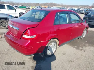 2011 Nissan Versa 1.8 S with VIN 3N1BC1AP2BL360106, listed as a IAAI auction lot 41667730 with 210,848 mi miles. Bid and sale history available at carsss.com. Image 4.