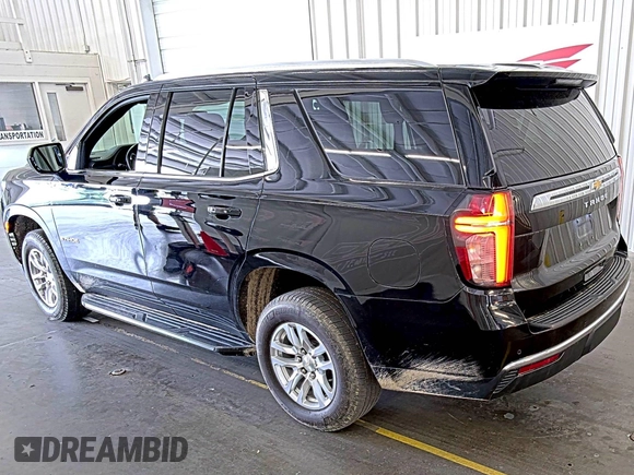 2022 Chevrolet Tahoe LS z VIN 1GNSKMKD7NR129745, wystawiony jako IAAI lot #42566236 z przebiegiem 95 126 mil mil oraz . Historia ofert i sprzedaży dostępna na DreamBid. Obrazek 15.