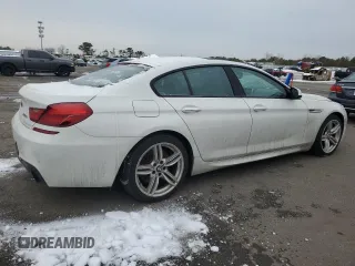 2015 BMW 6 Series 640i xDrive z VIN WBA6B8C55FD452972, wystawiony jako Copart lot #44559495 z przebiegiem 114 358 mil mil oraz Szkoda całkowita • Salvage title. Historia ofert i sprzedaży dostępna na DreamBid. Obrazek 3.