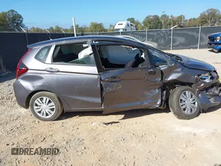 2017 Honda Fit LX with VIN JHMGK5H58HS022560, listed as a IAAI auction lot 40710663 with 86,228 mi miles and . Bid and sale history available at DreamBid. Image 13.