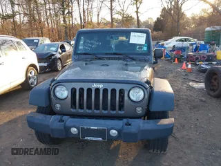 2018 Jeep Wrangler JK Unlimited Sport with VIN 1C4BJWDG2JL810424, listed as a IAAI auction lot 41610669 with 73,830 mi miles. Bid and sale history available at carsss.com. Image 12.