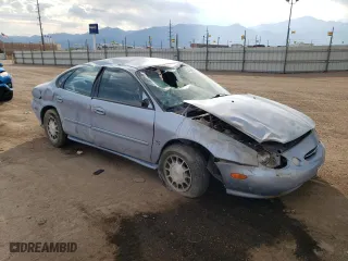 1998 Ford Taurus SE Comfort with VIN 1FAFP53S7WG223397, listed as a Copart auction lot 74794624 with 76,614 mi miles and Salvage Title. Bid and sale history available at carsss.com. Image 4.