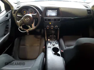 2016 Mazda CX-5 Sport z VIN JM3KE4BY0G0628372, wystawiony jako Copart lot #57534785 z przebiegiem 152 487 mil mil oraz Szkoda całkowita • Salvage title. Historia ofert i sprzedaży dostępna na DreamBid. Obrazek 8.