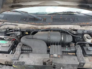 2003 Ford Econoline Passenger XL with VIN 1FBSS31L33HB64088, listed as a IAAI auction lot 42479333 with 189,428 mi miles and . Bid and sale history available at DreamBid. Image 10.