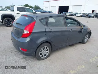 2012 Hyundai Accent GS with VIN KMHCT5AE7CU050253, listed as a IAAI auction lot 40601479 with 88,734 mi miles. Bid and sale history available at carsss.com. Image 4.