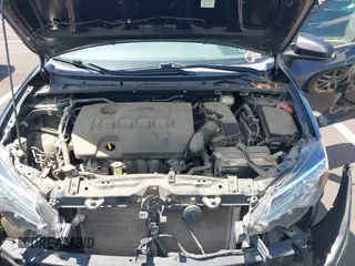 2019 Toyota Corolla L with VIN 5YFBURHE4KP860848, listed as a IAAI auction lot 42167529 with 152,301 mi miles. Bid and sale history available at carsss.com. Image 10.