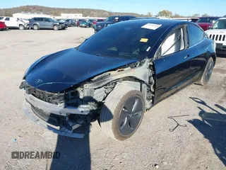 2020 Tesla Model 3 Standard Range Plus with VIN 5YJ3E1EA7LF802492, listed as a IAAI auction lot 40846048 with 36,488 mi miles and . Bid and sale history available at DreamBid. Image 2.