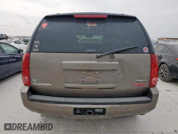 2011 GMC Yukon SLT z VIN 1GKS1CE01BR359134, wystawiony jako Copart lot #53693295 z przebiegiem 95 060 mil mil oraz Szkoda całkowita • Salvage title. Historia ofert i sprzedaży dostępna na DreamBid. Obrazek 6.