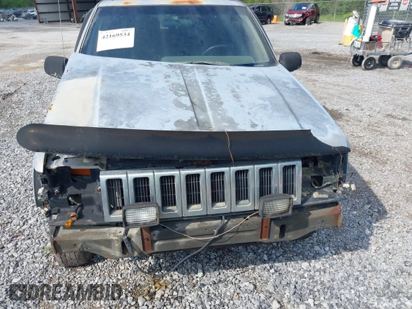 1995 Jeep Grand Cherokee Laredo with VIN 1J4GZ58S6SC756256, listed as a IAAI auction lot 42169534 with 255,516 mi miles. Bid and sale history available at carsss.com. Image 6.