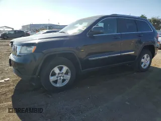 2012 Jeep Grand Cherokee Laredo with VIN 1C4RJEAG1CC334201, listed as a Copart auction lot 83696774 with 208,639 mi miles and Clean Title. Bid and sale history available at carsss.com. Image 1.
