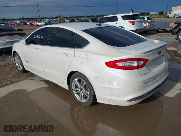 2016 Ford Fusion SE Hybrid z VIN 3FA6P0LU2GR202472, wystawiony jako IAAI lot #42637403 z przebiegiem Nie podano mil oraz . Historia ofert i sprzedaży dostępna na DreamBid. Obrazek 3.