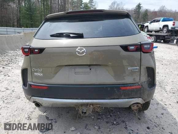 2023 Mazda CX-50 Premium z VIN 7MMVABDY5PN112353, wystawiony jako Copart lot #53861455 z przebiegiem Nie podano mil oraz Szkoda całkowita • Salvage title. Historia ofert i sprzedaży dostępna na DreamBid. Obrazek 6.