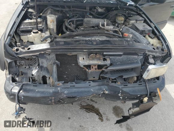 1999 Chevrolet Blazer LS with VIN 1GNCT18W6XK224253, listed as a Copart auction lot 50708405 with 209,711 mi miles and Salvage title. Bid and sale history available at DreamBid. Image 12.