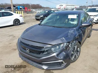 2019 Honda Civic LX with VIN 19XFC2F61KE037495, listed as a IAAI auction lot 41891007 with 90,262 mi miles and . Bid and sale history available at DreamBid. Image 2.