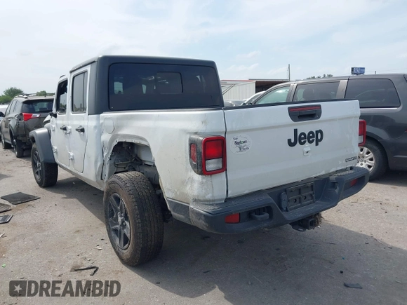 2020 Jeep Gladiator Sport S with VIN 1C6HJTAG9LL161535, listed as a IAAI auction lot 42053904 with 104,260 mi miles and . Bid and sale history available at DreamBid. Image 3.